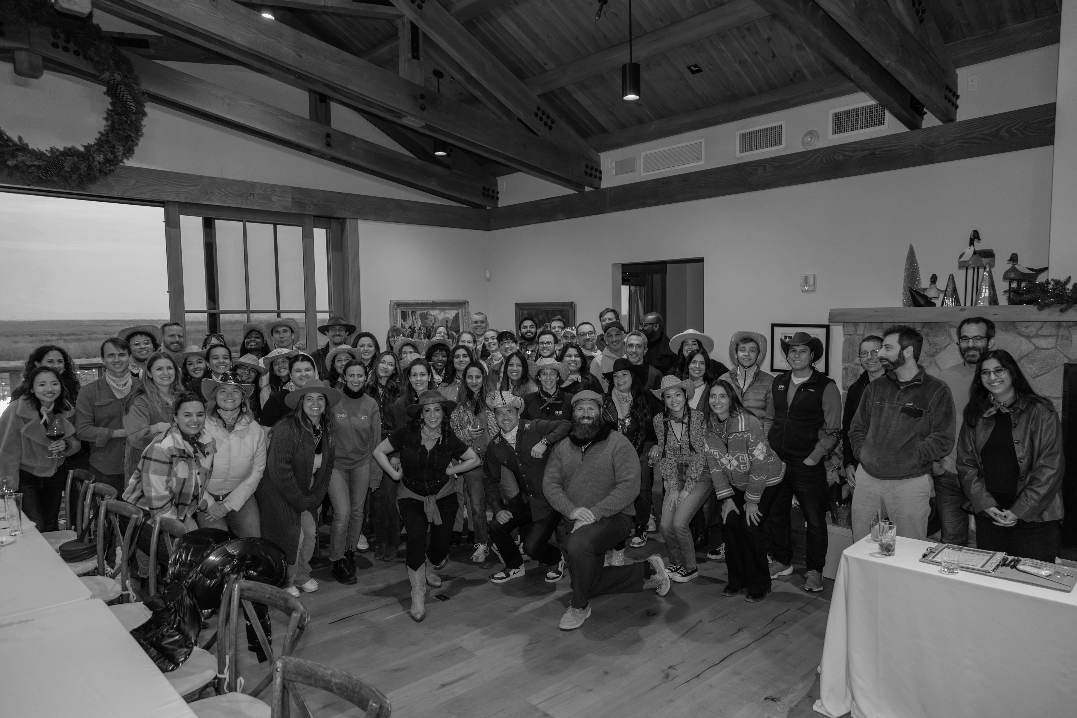 employees posing for a group shot at a retreat