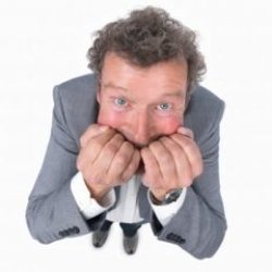 nervous man biting his nails