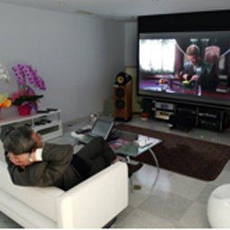 man watching tv in his living room