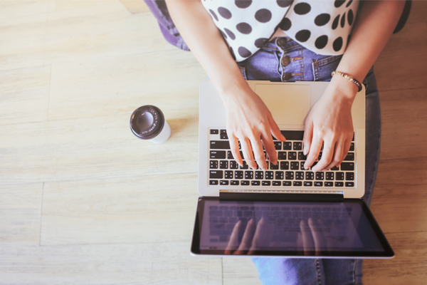 Girl typing on computer