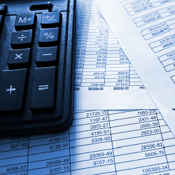 calculator on top of accounting papers