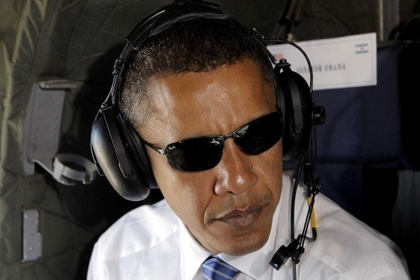 Obama in a helicopter with a headset