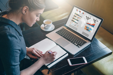 woman working on her laptop