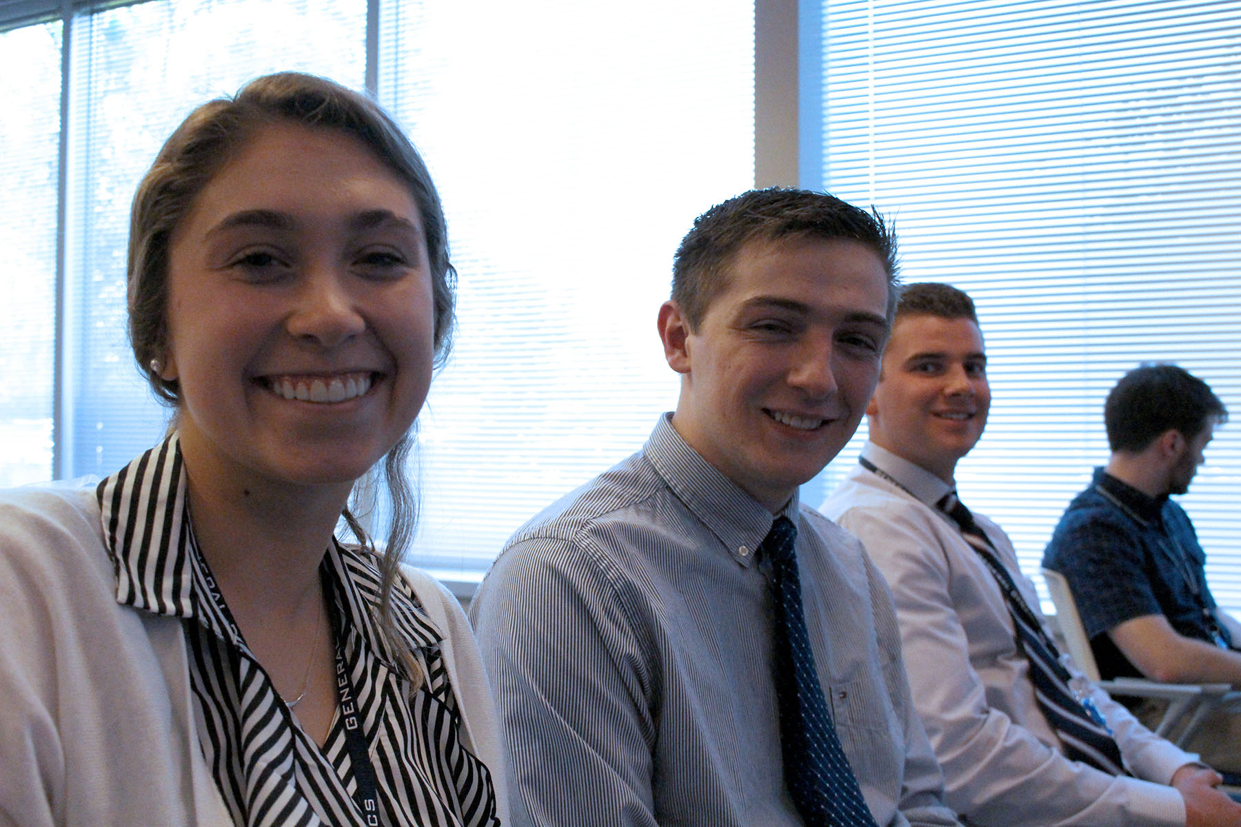group of employees smiling