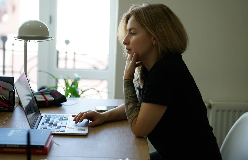 woman working at her computer
